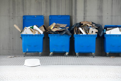 Crew carrying desks down stairs during an office clearance